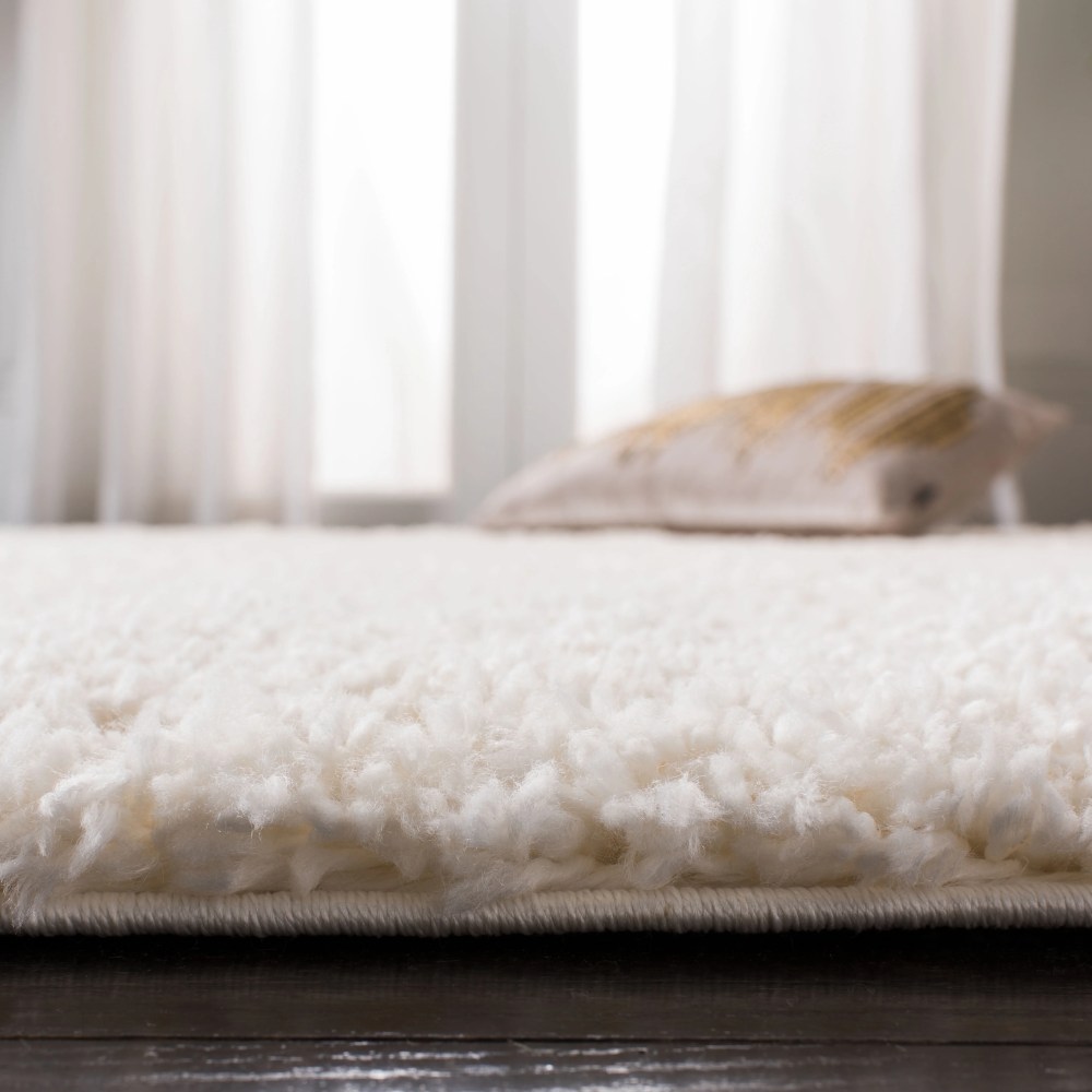 SAFAVIEH Fontana Jamie Solid Shag Area Rug, Ivory, 5'3" x 7'6" - Image 7