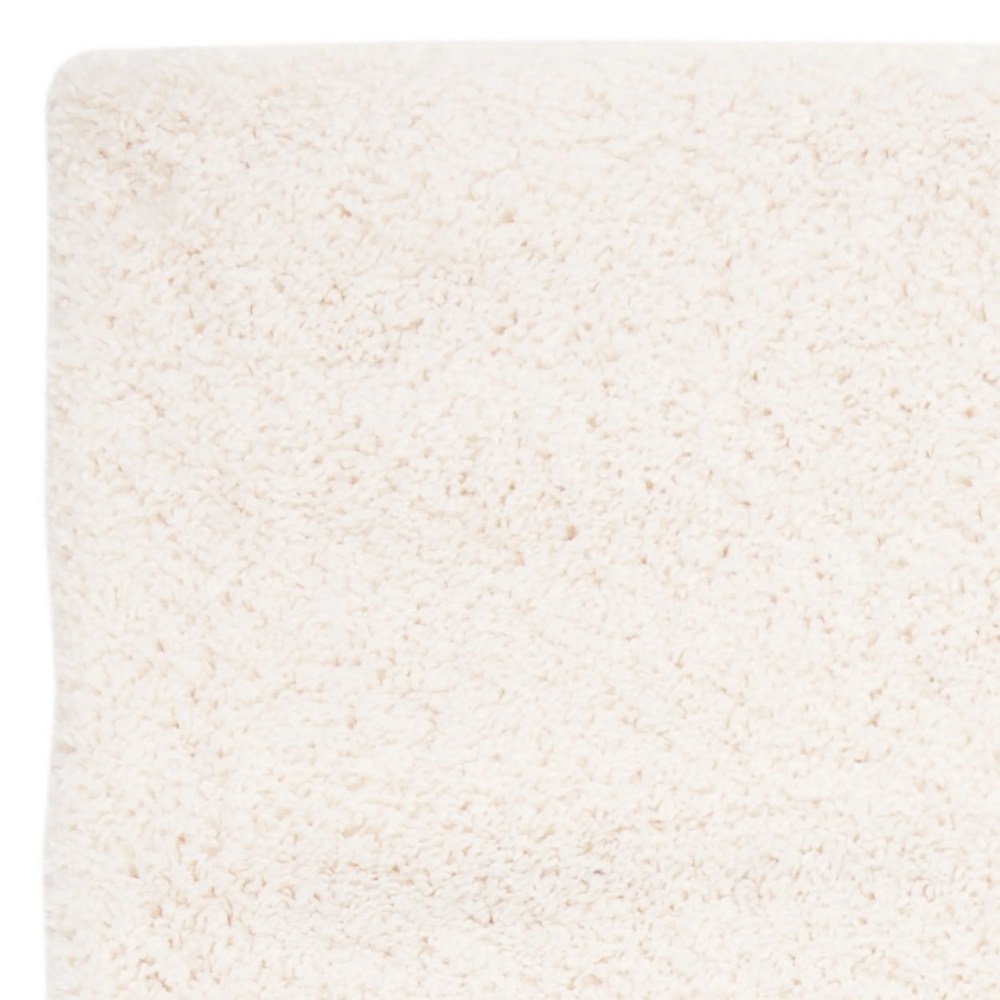 SAFAVIEH Fontana Jamie Solid Shag Area Rug, Ivory, 5'3" x 7'6" - Image 3