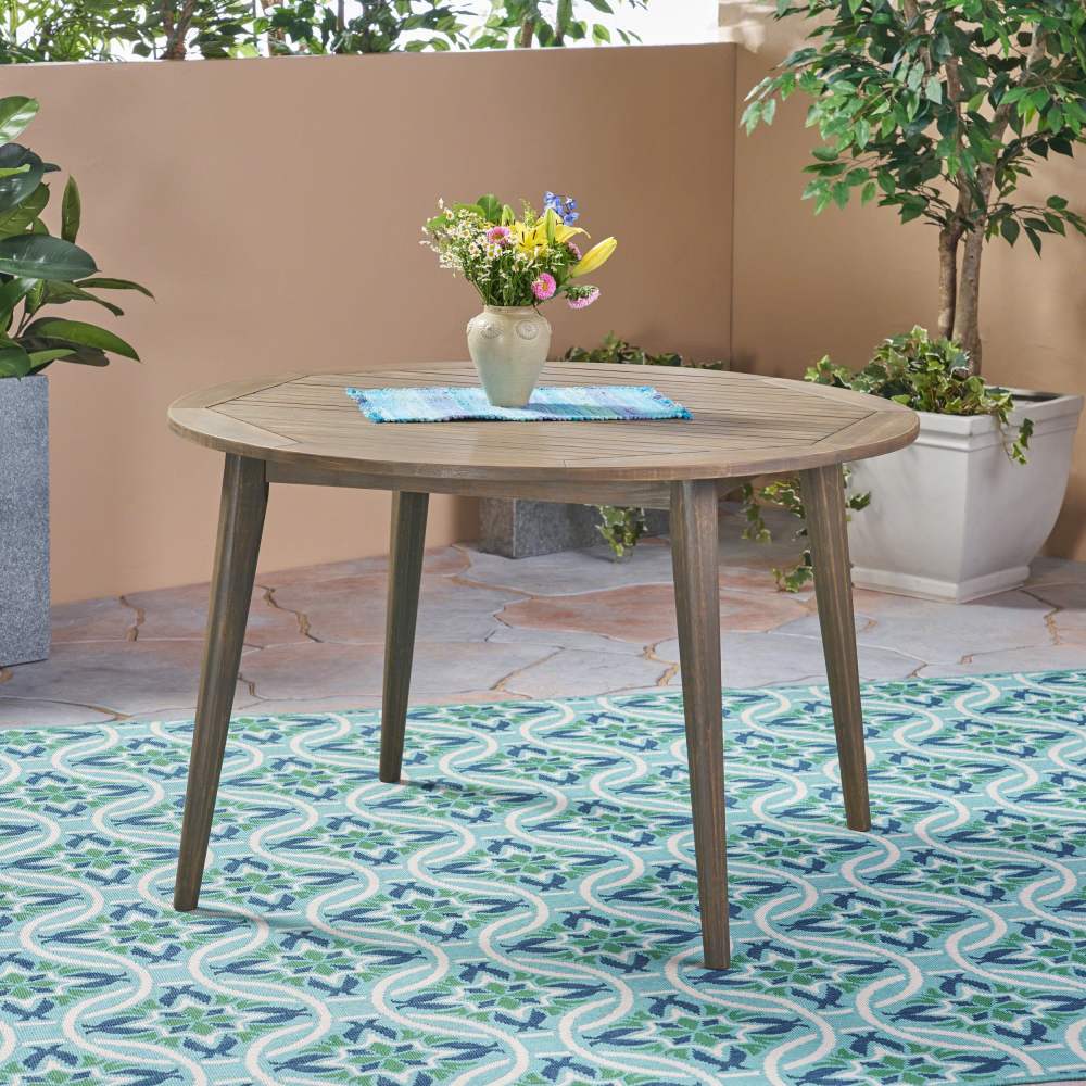 Noble House Stamford 47.25" Round Wooden Patio Dining Table in Gray