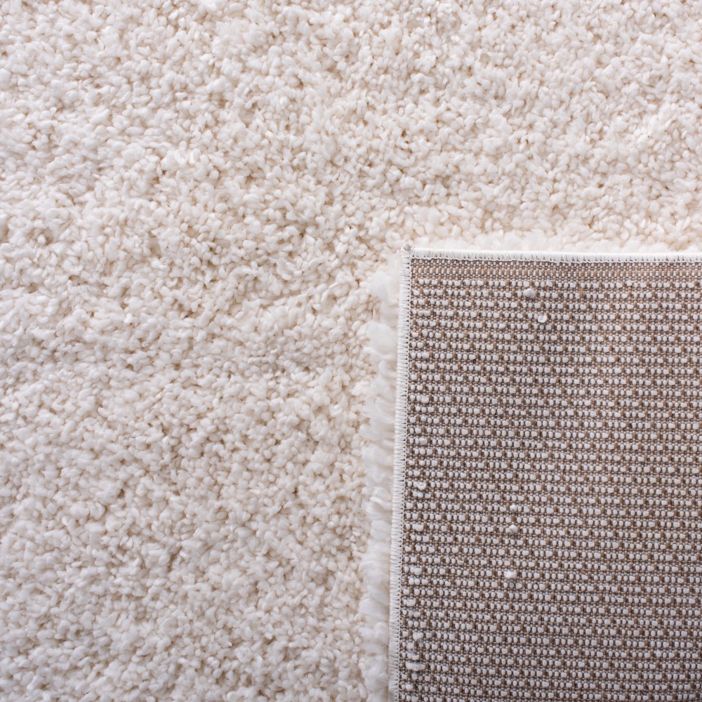 SAFAVIEH Fontana Jamie Solid Shag Area Rug, Ivory, 5'3" x 7'6" - Image 6