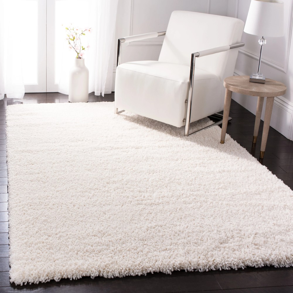 SAFAVIEH Fontana Jamie Solid Shag Area Rug, Ivory, 5'3" x 7'6" - Image 9