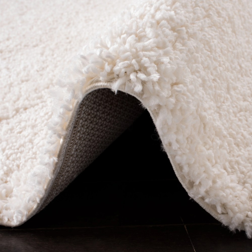 SAFAVIEH Fontana Jamie Solid Shag Area Rug, Ivory, 5'3" x 7'6" - Image 11