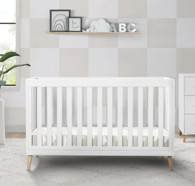 Delta Children Essex 4-in-1 Convertible Baby Crib, Bianca White/Natural Legs